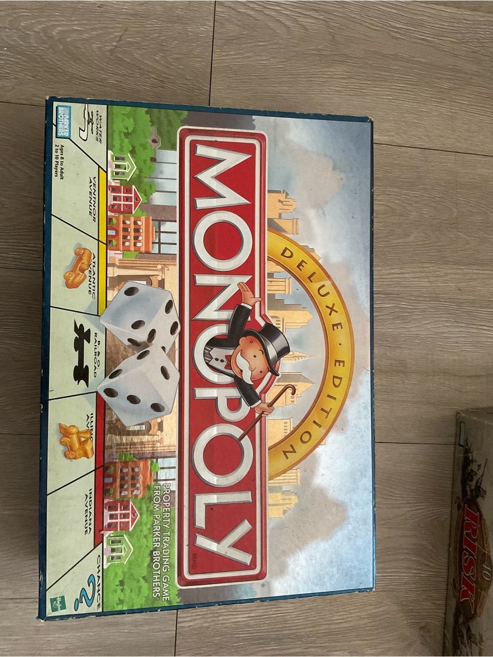 Hasbro Monopoly Deluxe Edition Box - Red, Gold, White, Blue